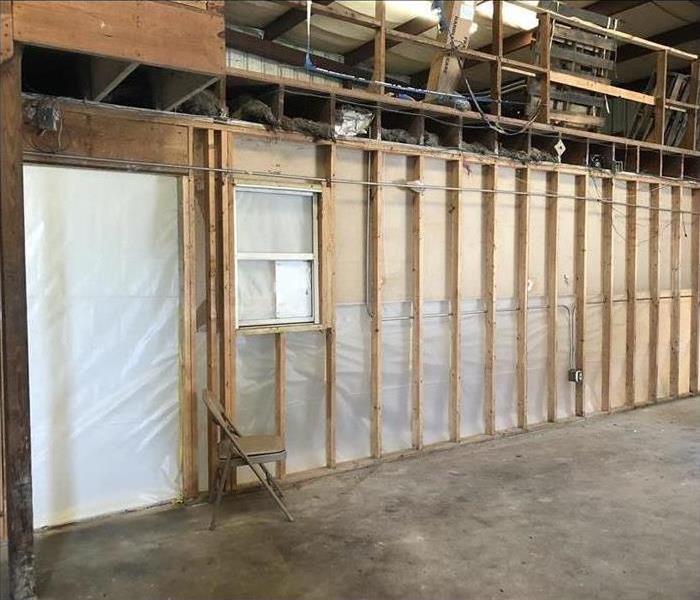 Wall inside a Melbourne Beach commercial site, with drying chamber.